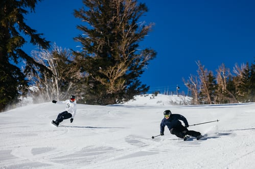Skier and Snowboarder at Mammoth Mountain